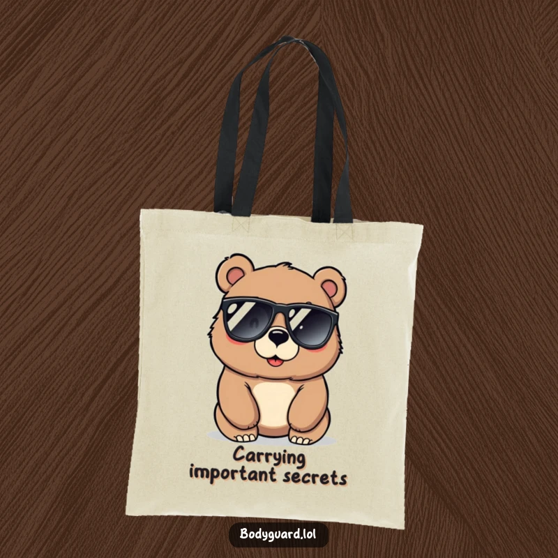 Funny bear tote bag featuring a large, protective bear illustration wearing sunglasses, looking alertly with a cool, vigilant vibe.